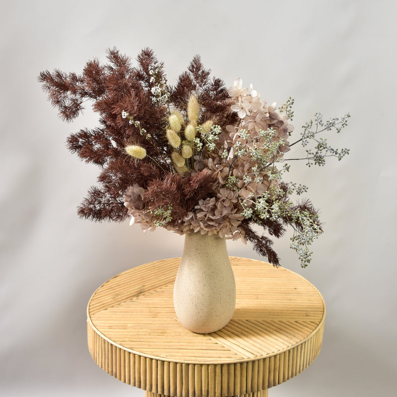 Dried Flower Arrangement in Pitcher Vase